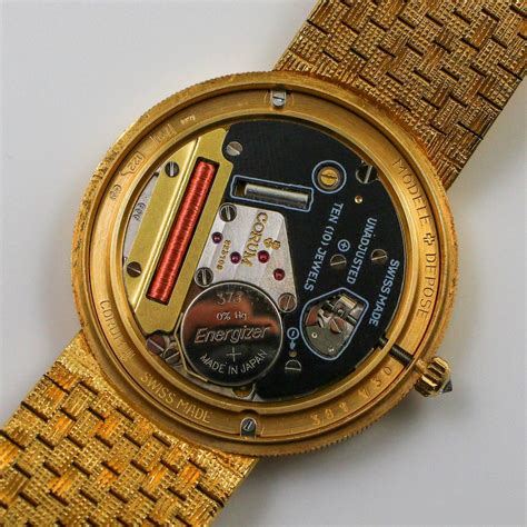 corum coin watch for sale.